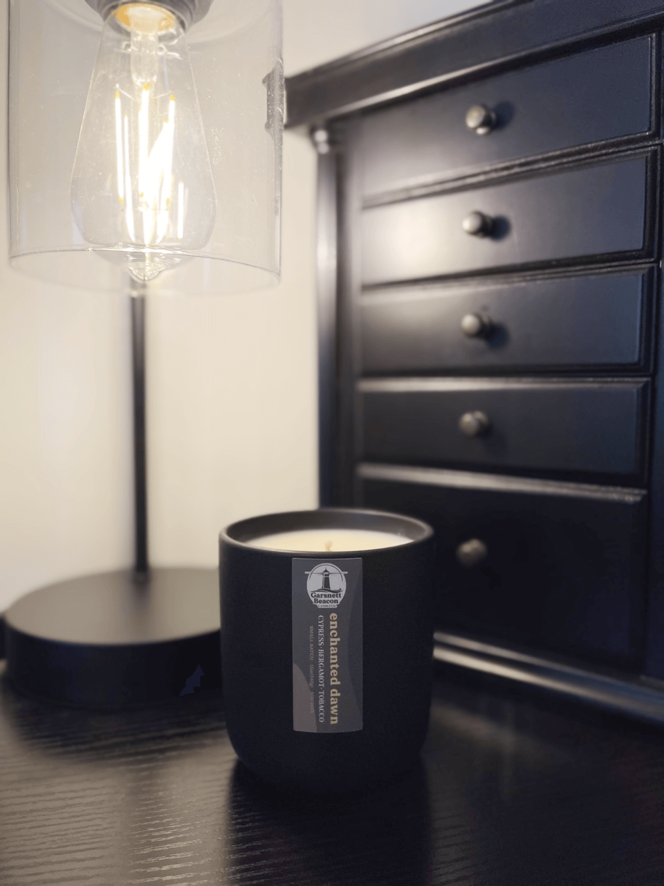Cypress Bergamot Saffron Flower Patchoili scented candles called Enchanted Dawn in glass ceramic tin and wax melts