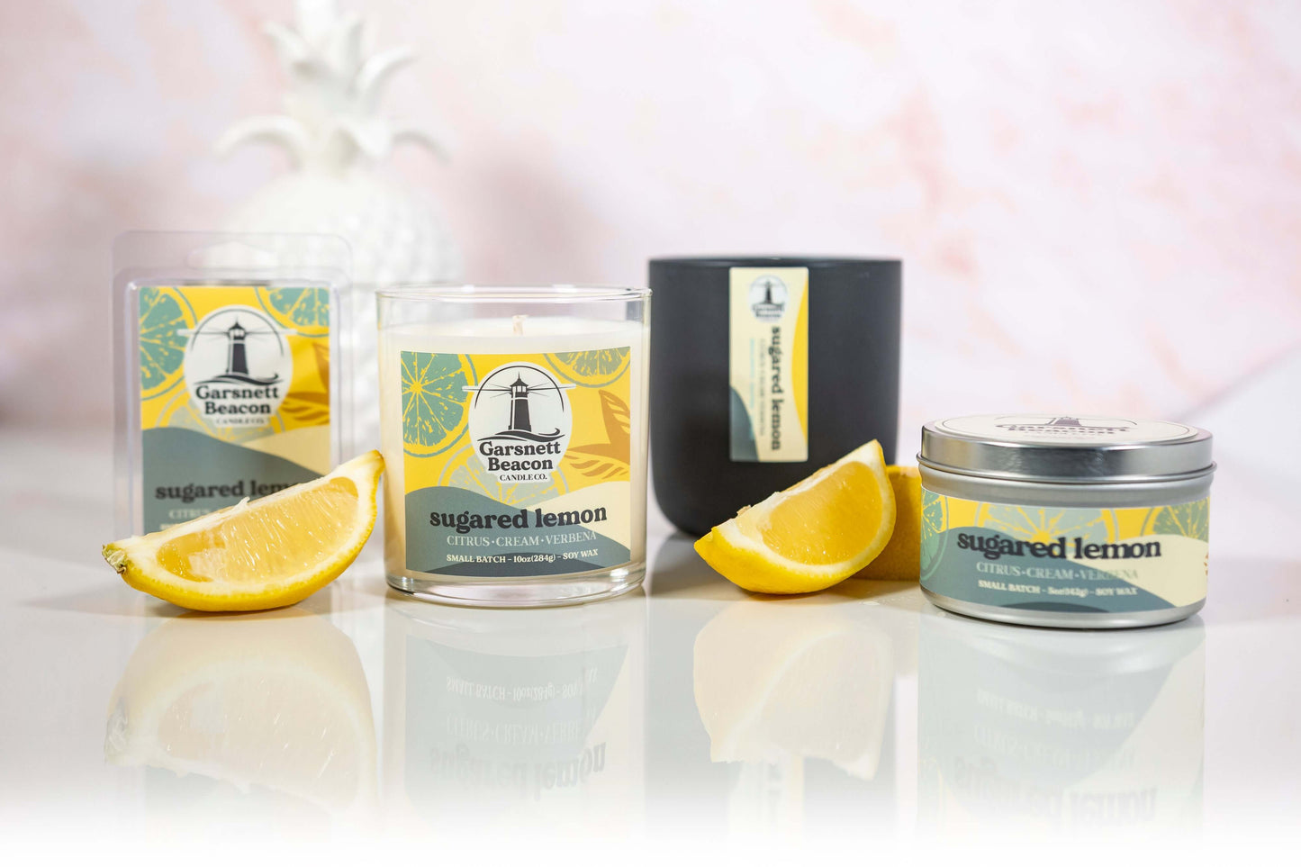 Lemon Cream Vanilla Citrus Verbena scented candles called Sugared Lemon in glass ceramic tin and wax melts