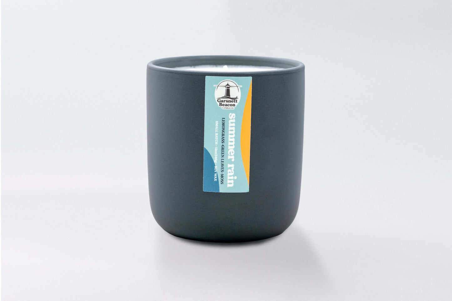Lemongrass Green Leaves Lily of the Valley Ozone Moss scented candles called Summer Rain in glass ceramic tin and wax melts