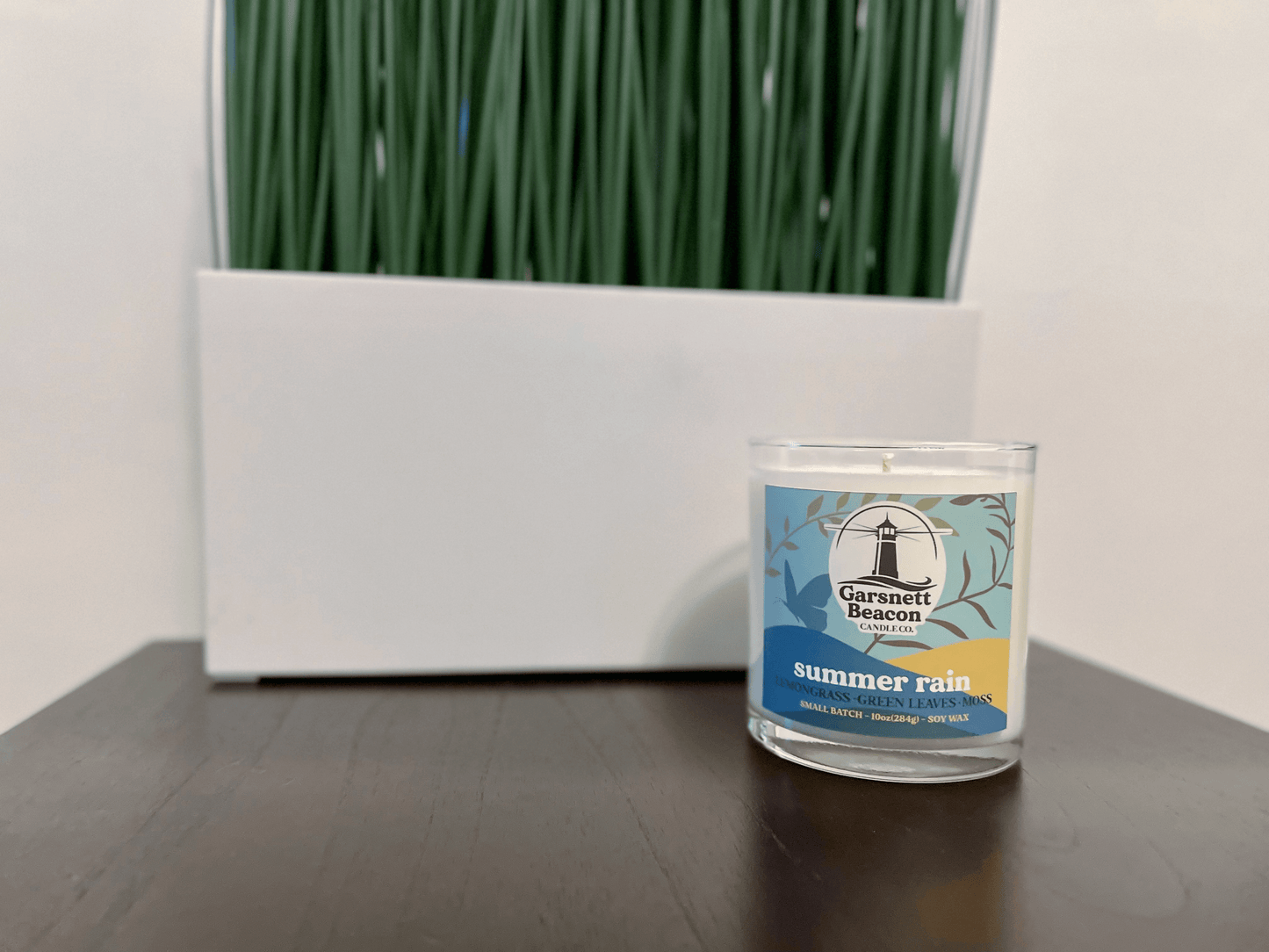 Lemongrass Green Leaves Lily of the Valley Ozone Moss scented candles called Summer Rain in glass ceramic tin and wax melts
