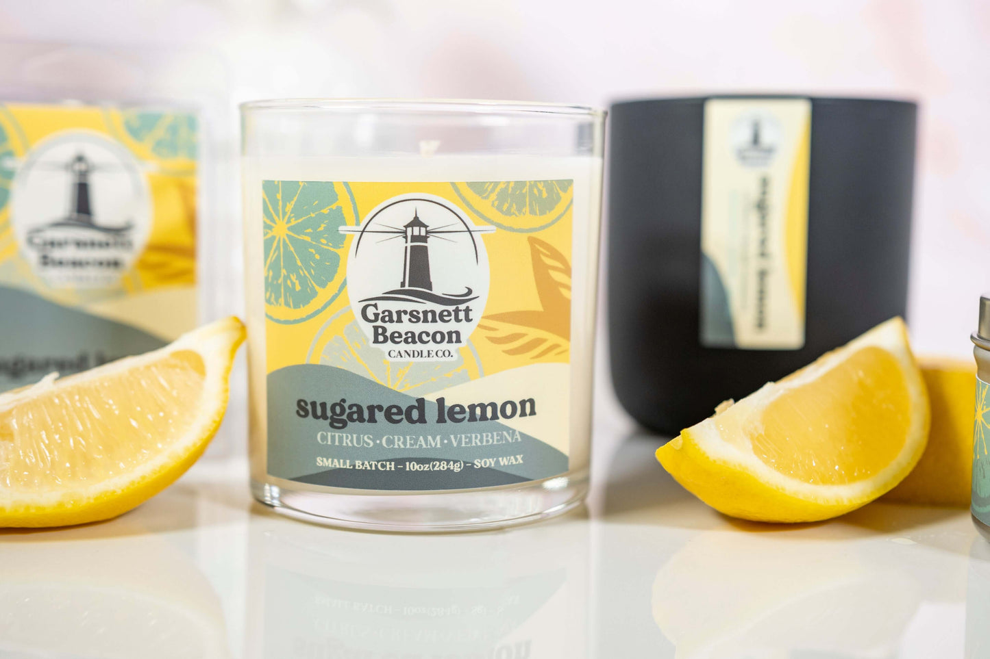 Lemon Cream Vanilla Citrus Verbena scented candles called Sugared Lemon in glass ceramic tin and wax melts
