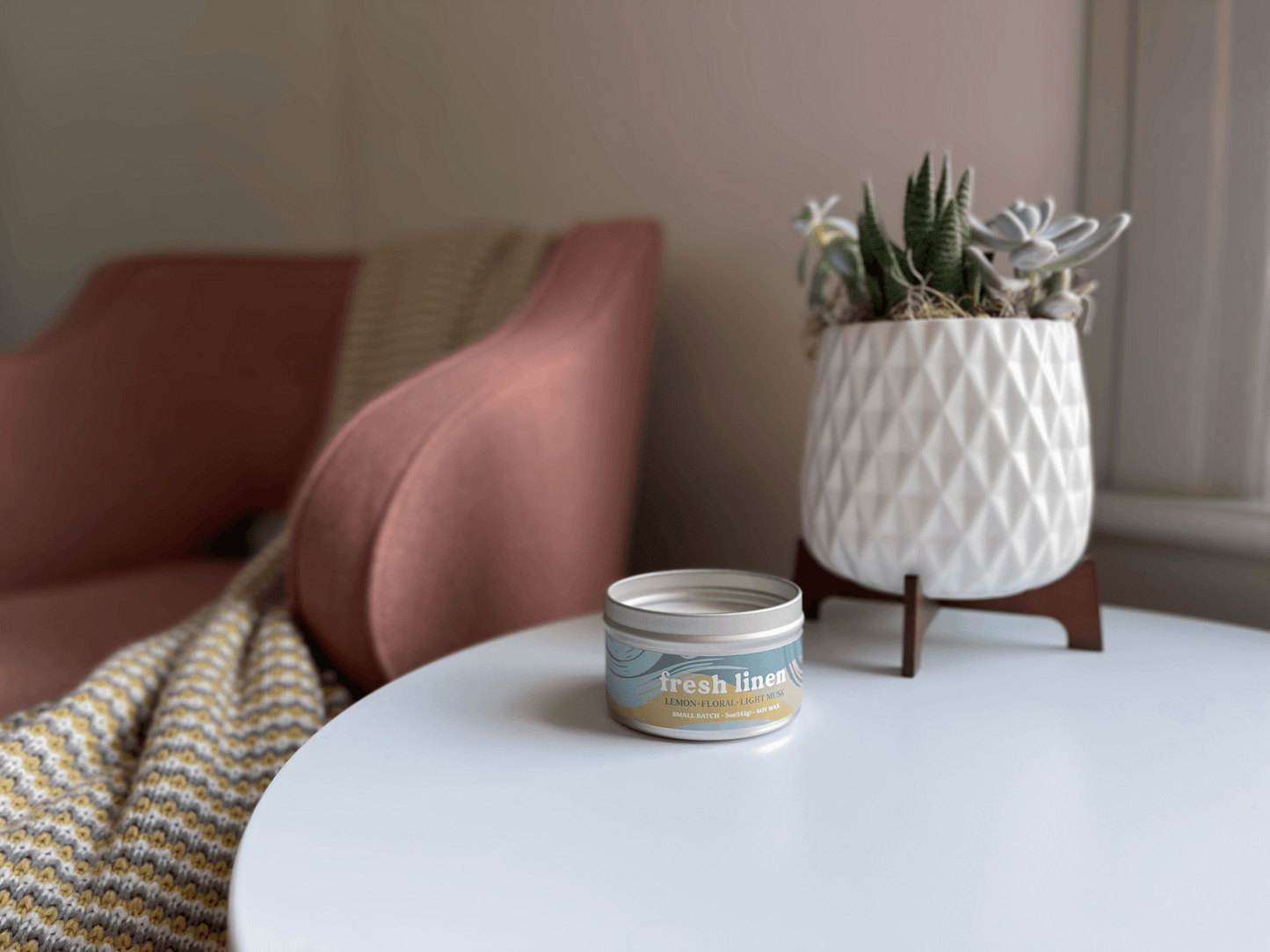 Lemon Linen Floral Ozone Light Musk scented candles called Fresh Linen in glass ceramic tin and wax melts