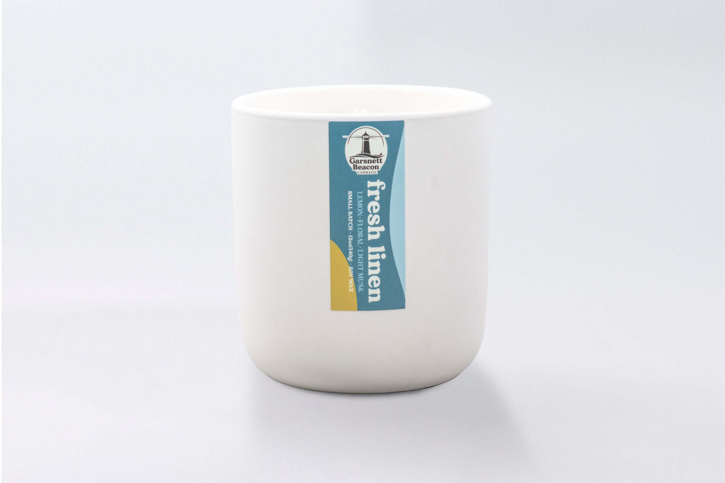 Lemon Linen Floral Ozone Light Musk scented candles called Fresh Linen in glass ceramic tin and wax melts