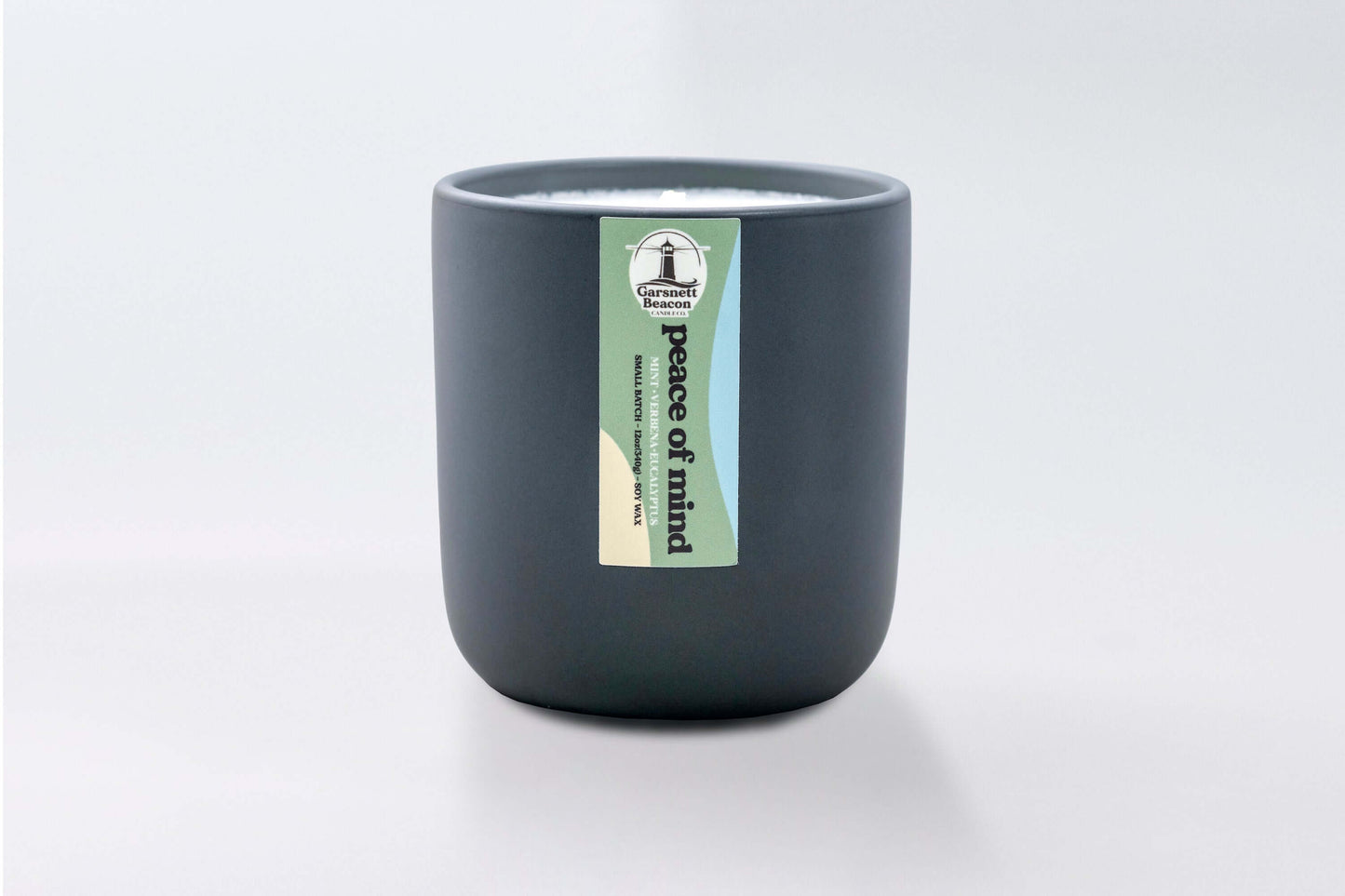 Fresh Mint Verbena Greens Eucalyptus scented candles called Peace of Mind in glass ceramic tin and wax melts