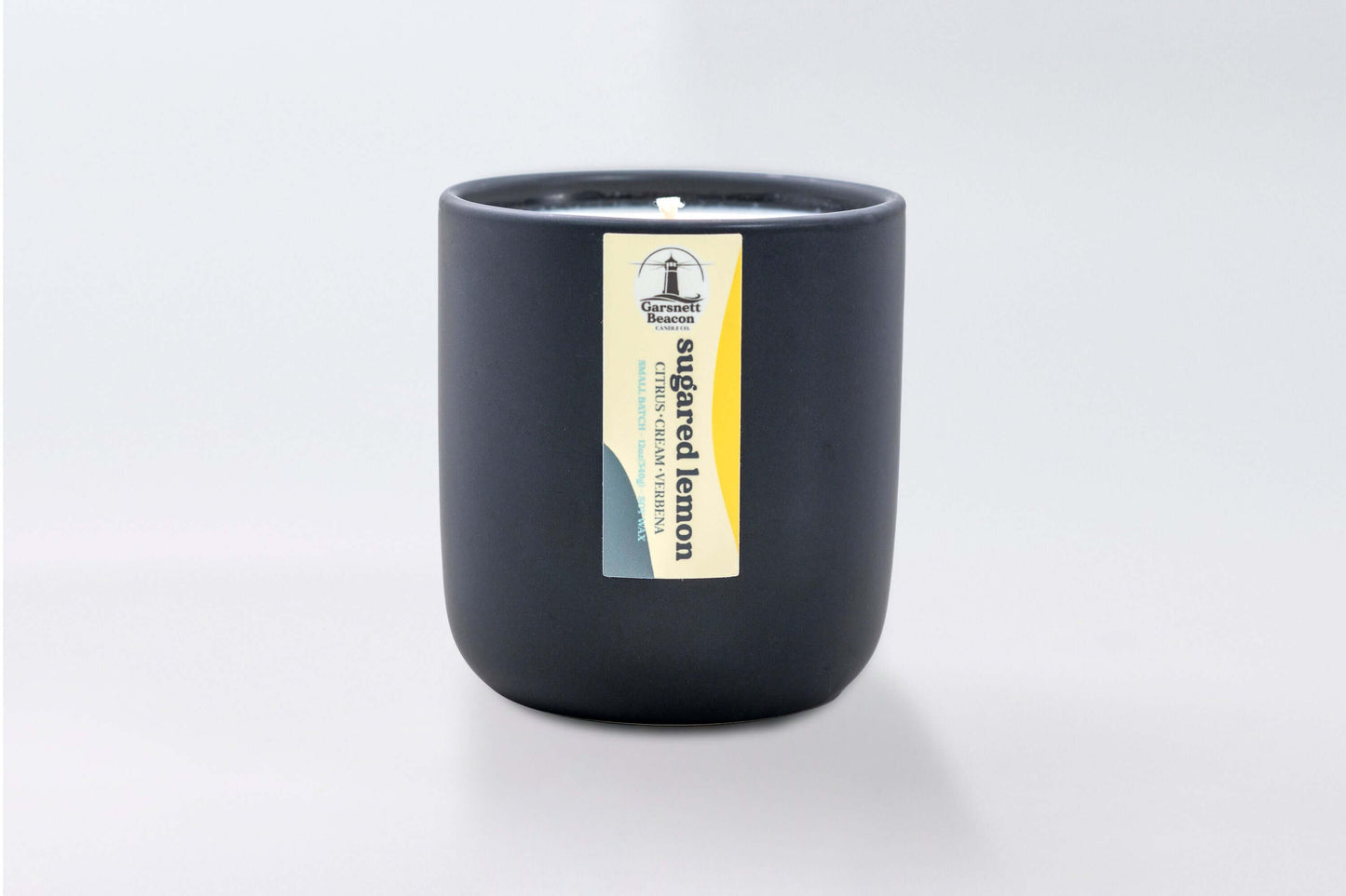 Lemon Cream Vanilla Citrus Verbena scented candles called Sugared Lemon in glass ceramic tin and wax melts