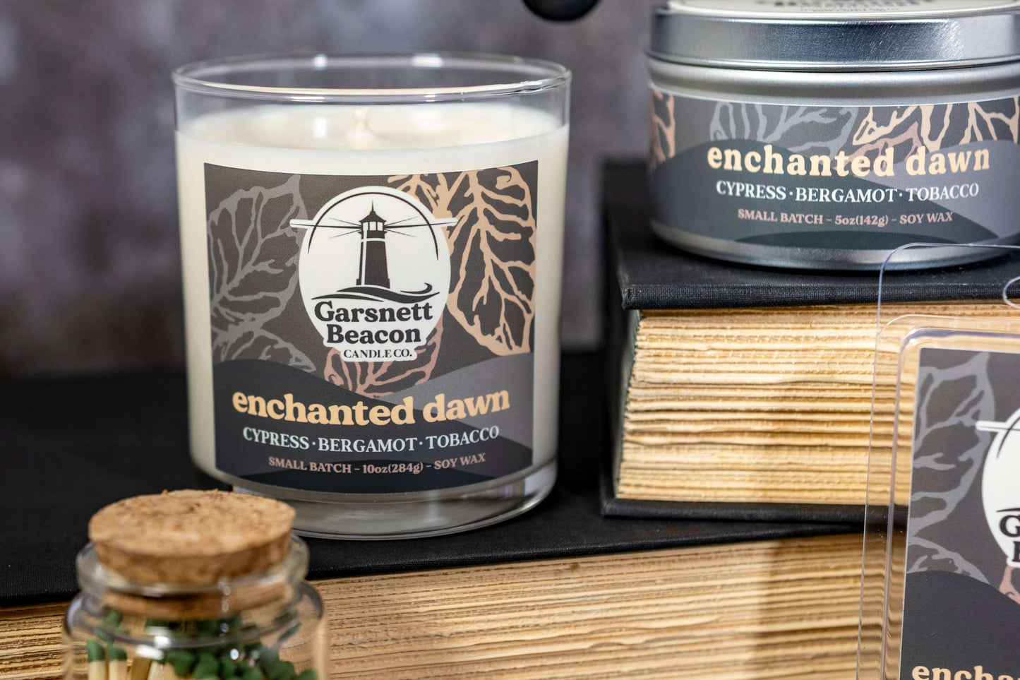 Cypress Bergamot Saffron Flower Patchoili scented candles called Enchanted Dawn in glass ceramic tin and wax melts