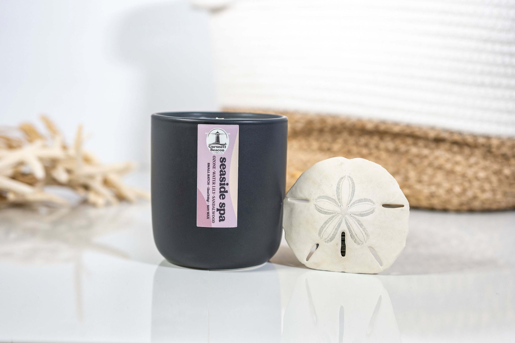 Jasmine Water Lily Sandalwood Moss Ozone Apple scented candles called Seaside Spa in glass ceramic tin and wax melts