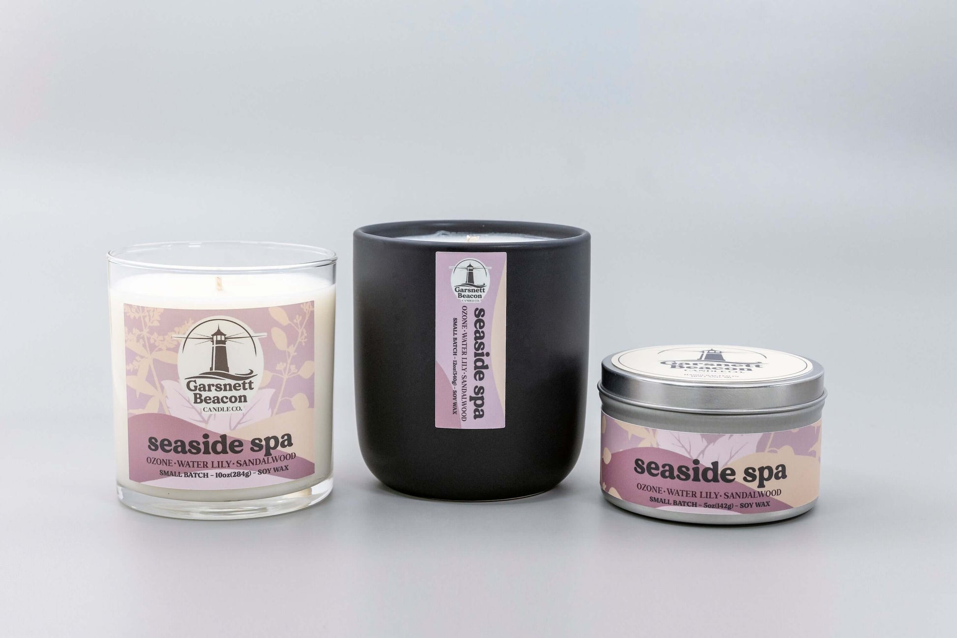 Jasmine Water Lily Sandalwood Moss Ozone Apple scented candles called Seaside Spa in glass ceramic tin and wax melts