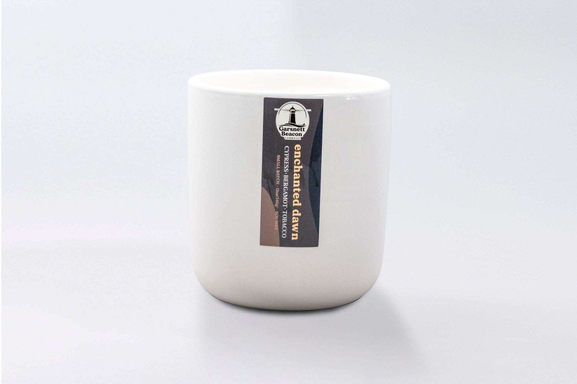 Cypress Bergamot Saffron Flower Patchoili scented candles called Enchanted Dawn in glass ceramic tin and wax melts